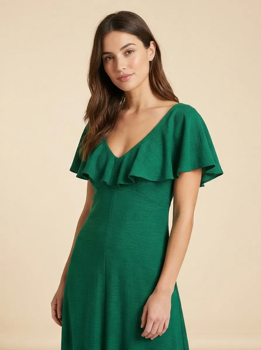 AI-generated lifestyle photo of green dress, variant 2: front close-up on model